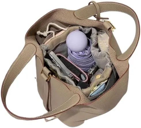 Bucket bag, a versatile and classic straw basket-style handbag made of top-layer cowhide for women